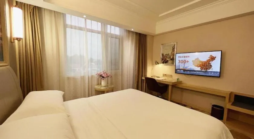 Bed in Vienna Hotel Shandong Qingdao Jiaodong International Airport Hai'er Avenue