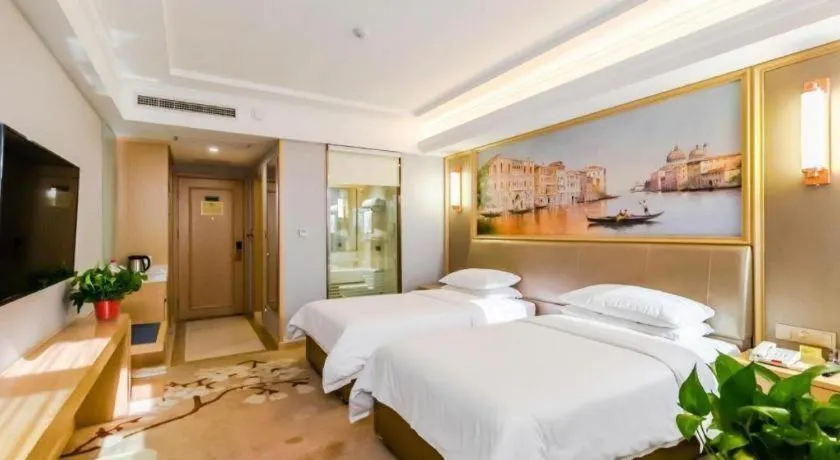 Bed in Vienna Hotel Shandong Qingdao Jiaodong International Airport Hai'er Avenue