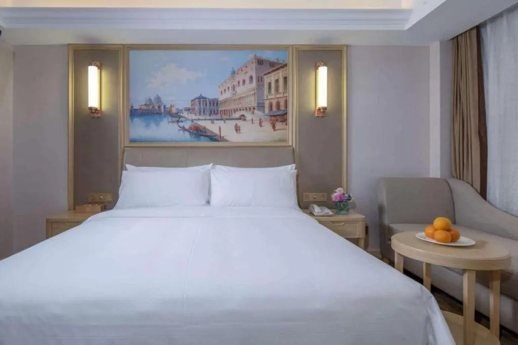 Bed in Vienna Hotel Shandong Qingdao Jiaodong International Airport Hai'er Avenue