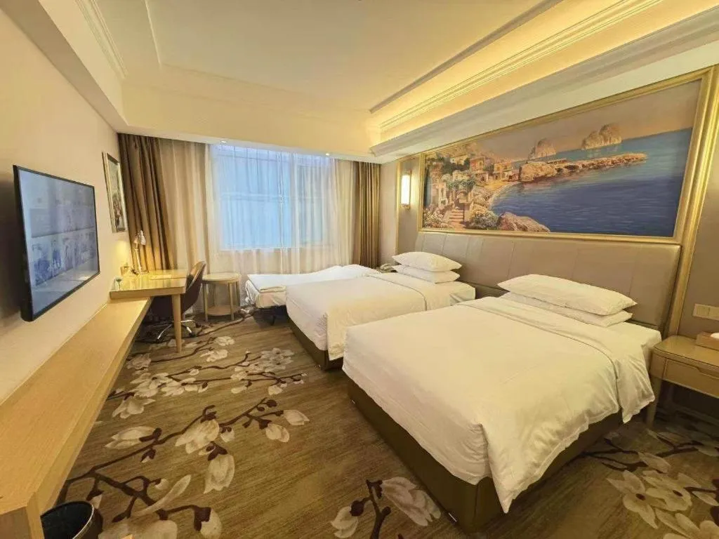 Bed in Vienna Hotel Shandong Qingdao Jiaodong International Airport Hai'er Avenue