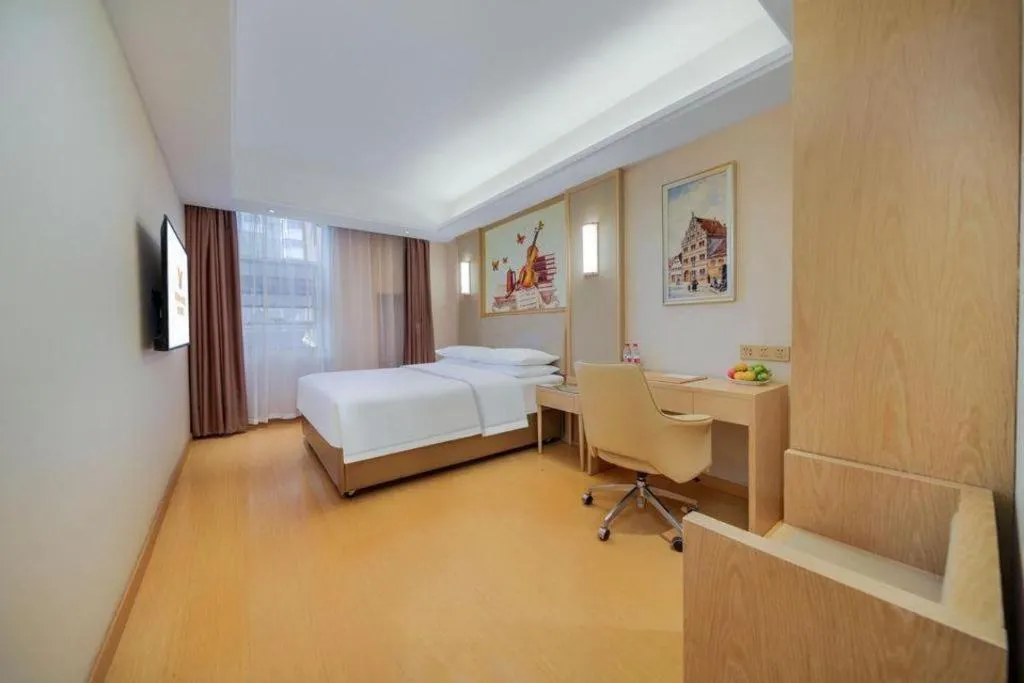 Bed in Vienna Hotel Zhengzhou Fengchan Road Fortune Plaza
