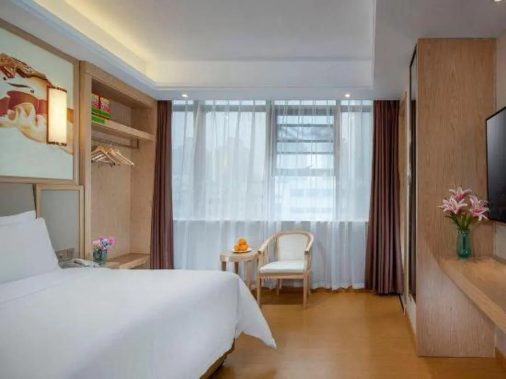 Bed in Vienna Hotel Zhengzhou Fengchan Road Fortune Plaza