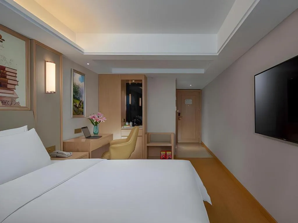 Bed in Vienna Hotel Zhengzhou Fengchan Road Fortune Plaza