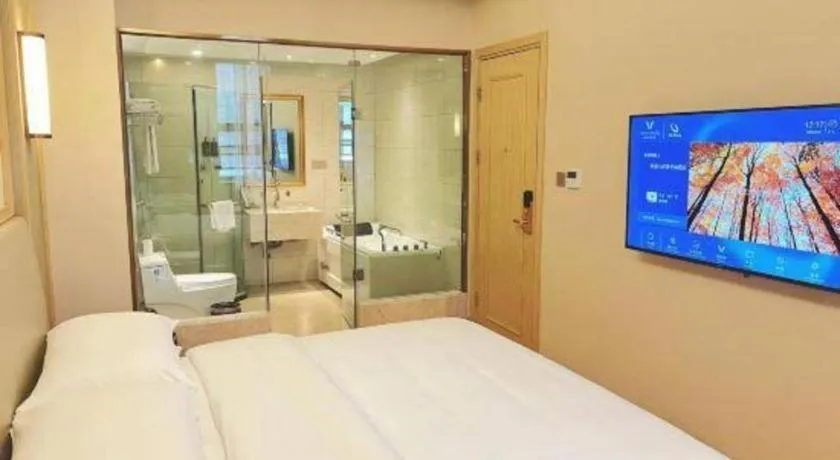 Bed in Vienna Hotel Zhengzhou Fengchan Road Fortune Plaza