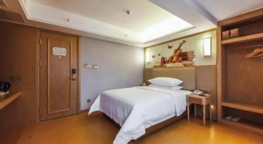 Bed in Vienna Hotel Zhengzhou Fengchan Road Fortune Plaza