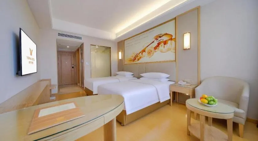 Bed in Vienna Hotel Zhengzhou Fengchan Road Fortune Plaza