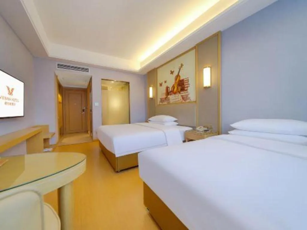 Bed in Vienna Hotel Zhengzhou Fengchan Road Fortune Plaza