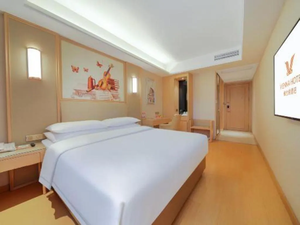 Bed in Vienna Hotel Zhengzhou Fengchan Road Fortune Plaza