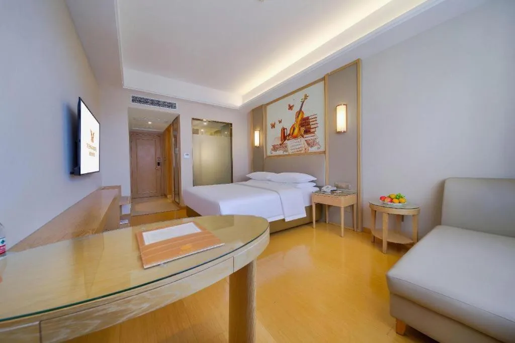 Bed in Vienna Hotel Zhengzhou Fengchan Road Fortune Plaza