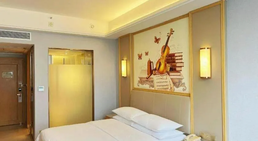 Bed in Vienna Hotel Zhengzhou Fengchan Road Fortune Plaza