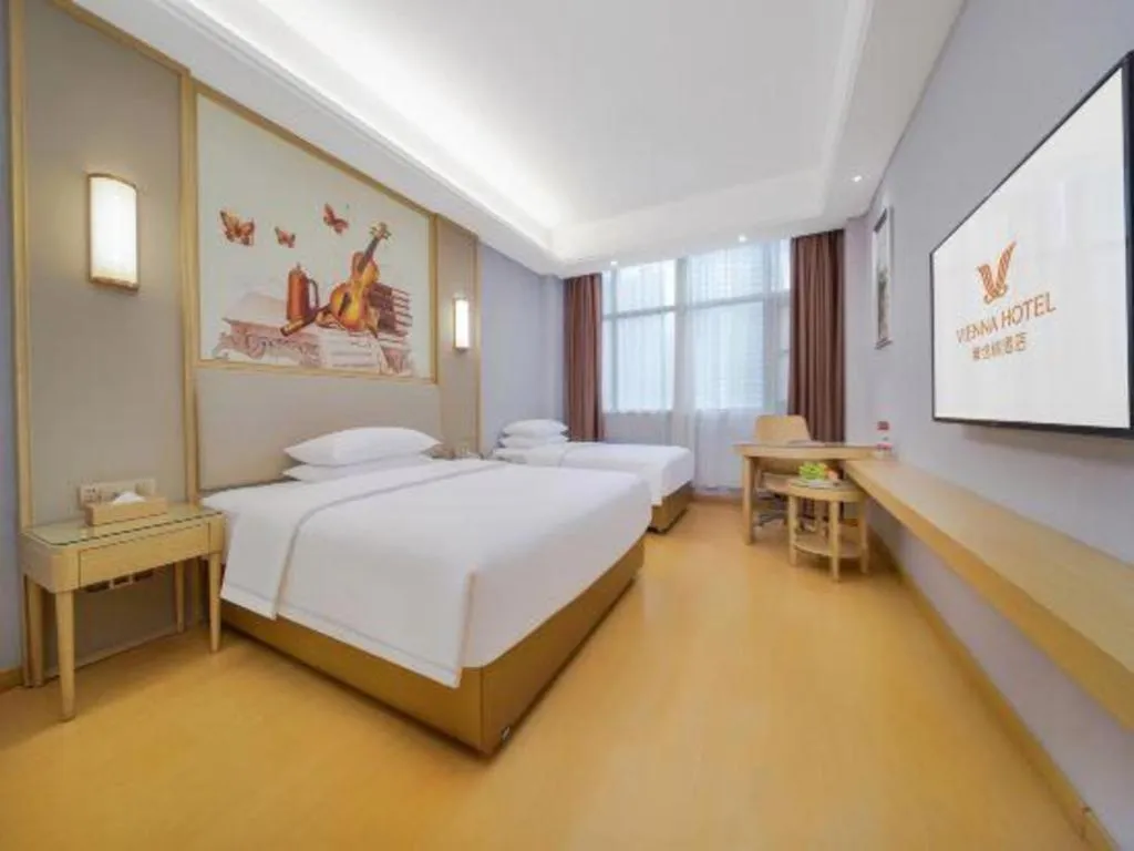 Bed in Vienna Hotel Zhengzhou Fengchan Road Fortune Plaza