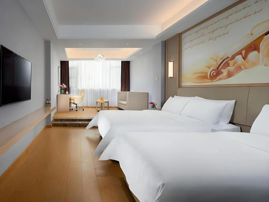 Bed in Vienna Hotel Zhengzhou Fengchan Road Fortune Plaza
