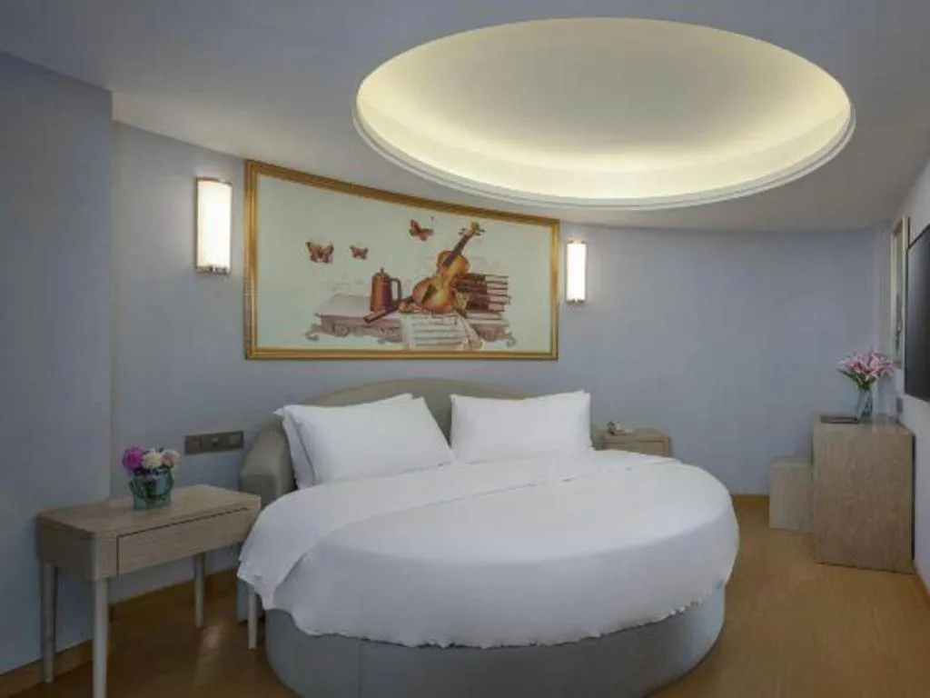 Bed in Vienna Hotel Zhengzhou Fengchan Road Fortune Plaza