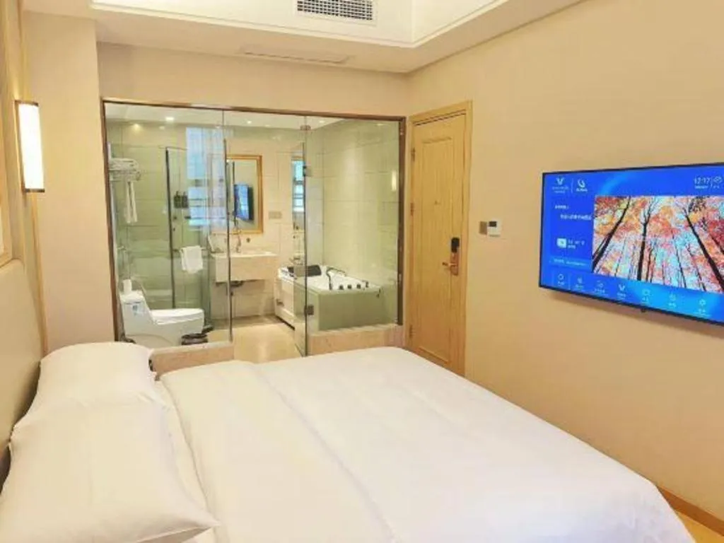 Bed in Vienna Hotel Zhengzhou Fengchan Road Fortune Plaza