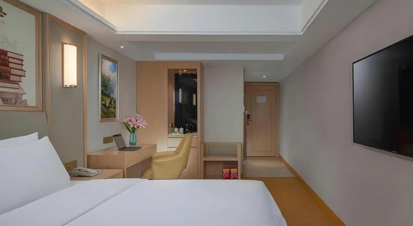 Bed in Vienna Hotel Zhengzhou Fengchan Road Fortune Plaza