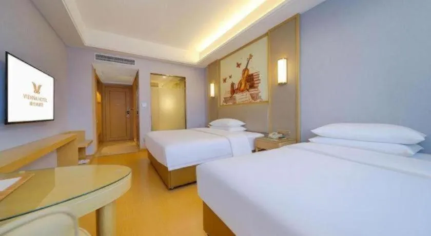 Bed in Vienna Hotel Zhengzhou Fengchan Road Fortune Plaza