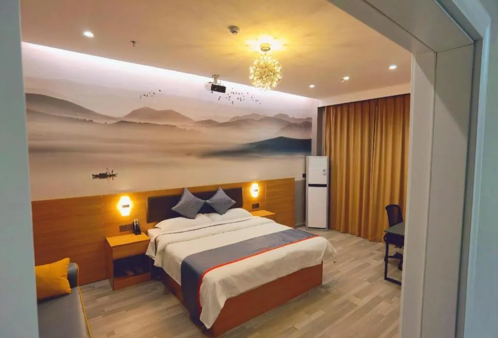 Bed in Jun Light Hotel Jiangxi Jiujiang Yongxiu County Dongyong Mall