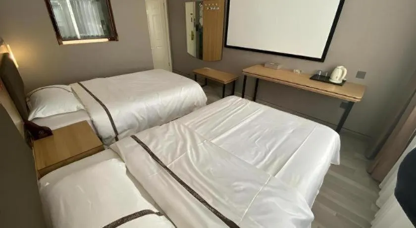Bed in Jun Light Hotel Jiangxi Jiujiang Yongxiu County Dongyong Mall