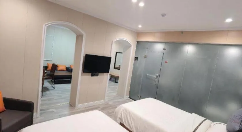 Bed in Jun Light Hotel Jiangxi Jiujiang Yongxiu County Dongyong Mall