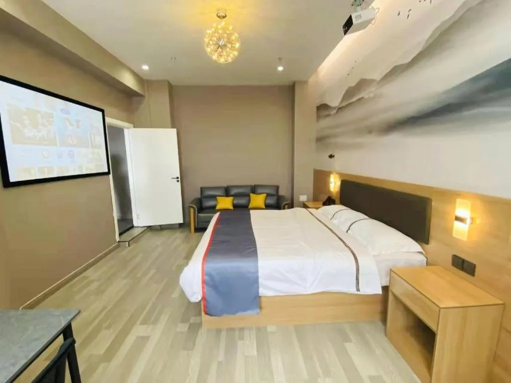 Bed in Jun Light Hotel Jiangxi Jiujiang Yongxiu County Dongyong Mall