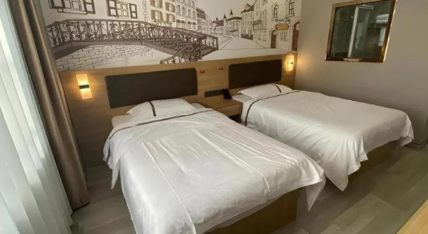 Bed in Jun Light Hotel Jiangxi Jiujiang Yongxiu County Dongyong Mall