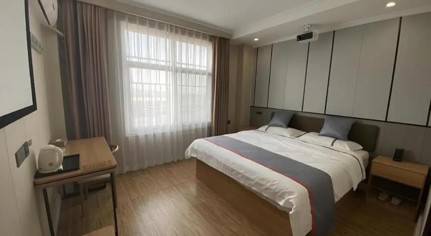 Bed in Jun Light Hotel Jiangxi Jiujiang Yongxiu County Dongyong Mall
