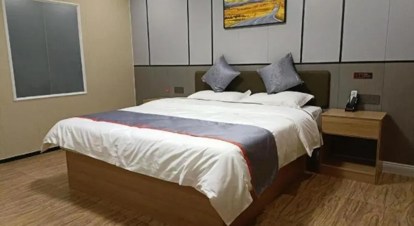 Bed in Jun Light Hotel Jiangxi Jiujiang Yongxiu County Dongyong Mall