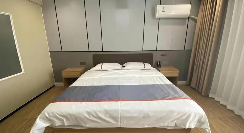 Bed in Jun Light Hotel Jiangxi Jiujiang Yongxiu County Dongyong Mall