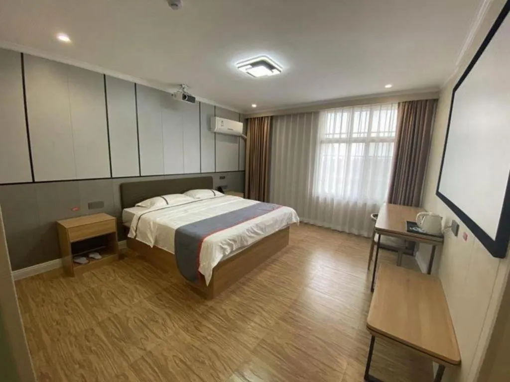 Bed in Jun Light Hotel Jiangxi Jiujiang Yongxiu County Dongyong Mall