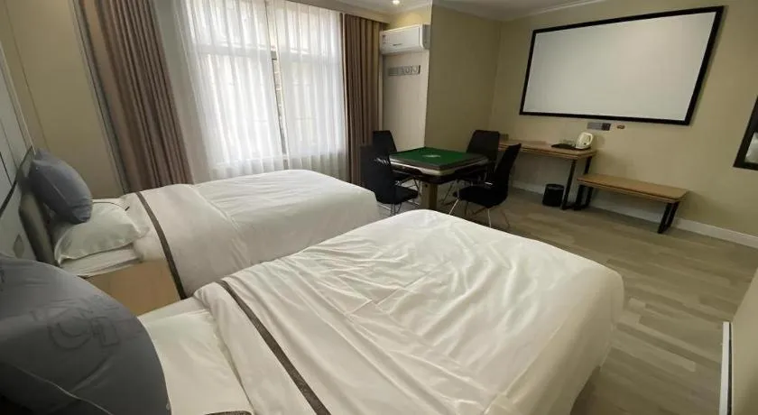 Bed in Jun Light Hotel Jiangxi Jiujiang Yongxiu County Dongyong Mall