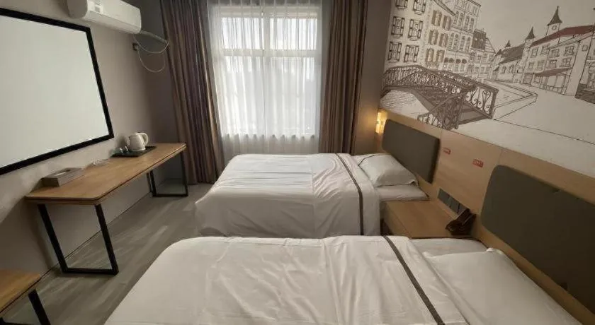 Bed in Jun Light Hotel Jiangxi Jiujiang Yongxiu County Dongyong Mall