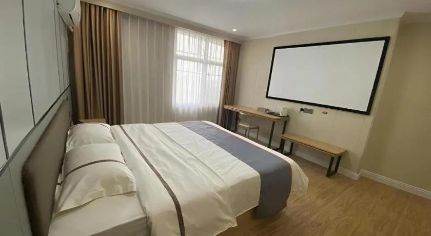 Bed in Jun Light Hotel Jiangxi Jiujiang Yongxiu County Dongyong Mall