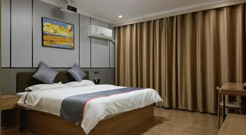 Bed in Jun Light Hotel Jiangxi Jiujiang Yongxiu County Dongyong Mall