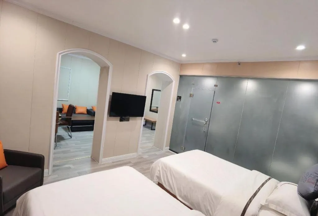 Bed in Jun Light Hotel Jiangxi Jiujiang Yongxiu County Dongyong Mall