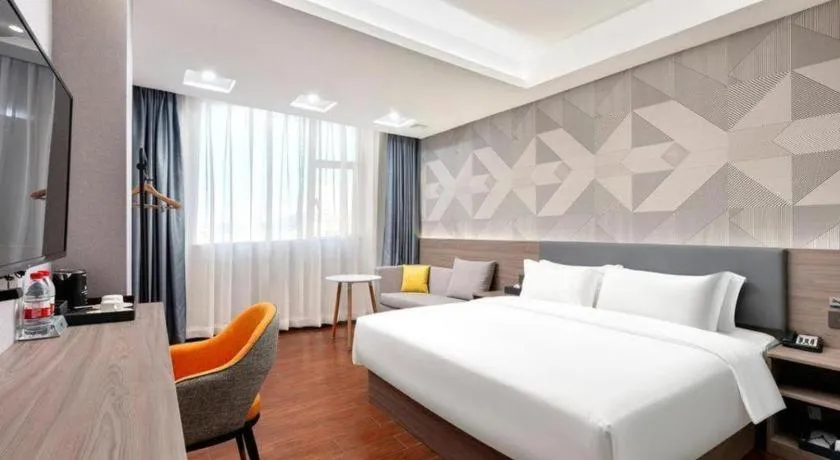 Bed in Borrman Hotel Huizhou Danshui High-speed Railway Huiyang Station
