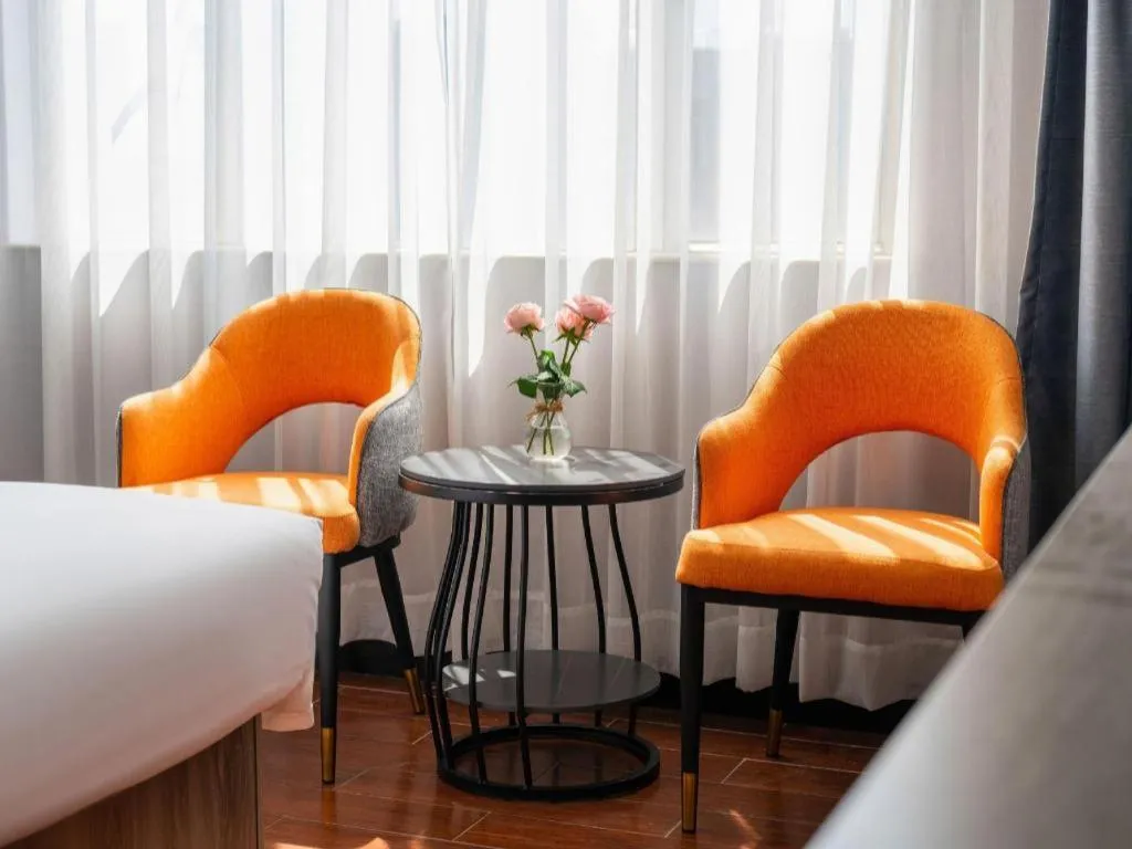 Bed in Borrman Hotel Huizhou Danshui High-speed Railway Huiyang Station