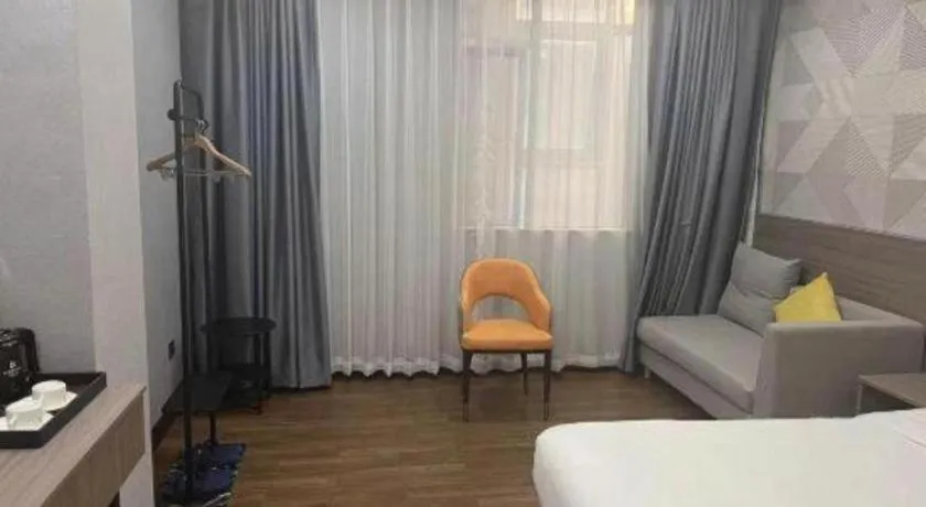 Bed in Borrman Hotel Huizhou Danshui High-speed Railway Huiyang Station