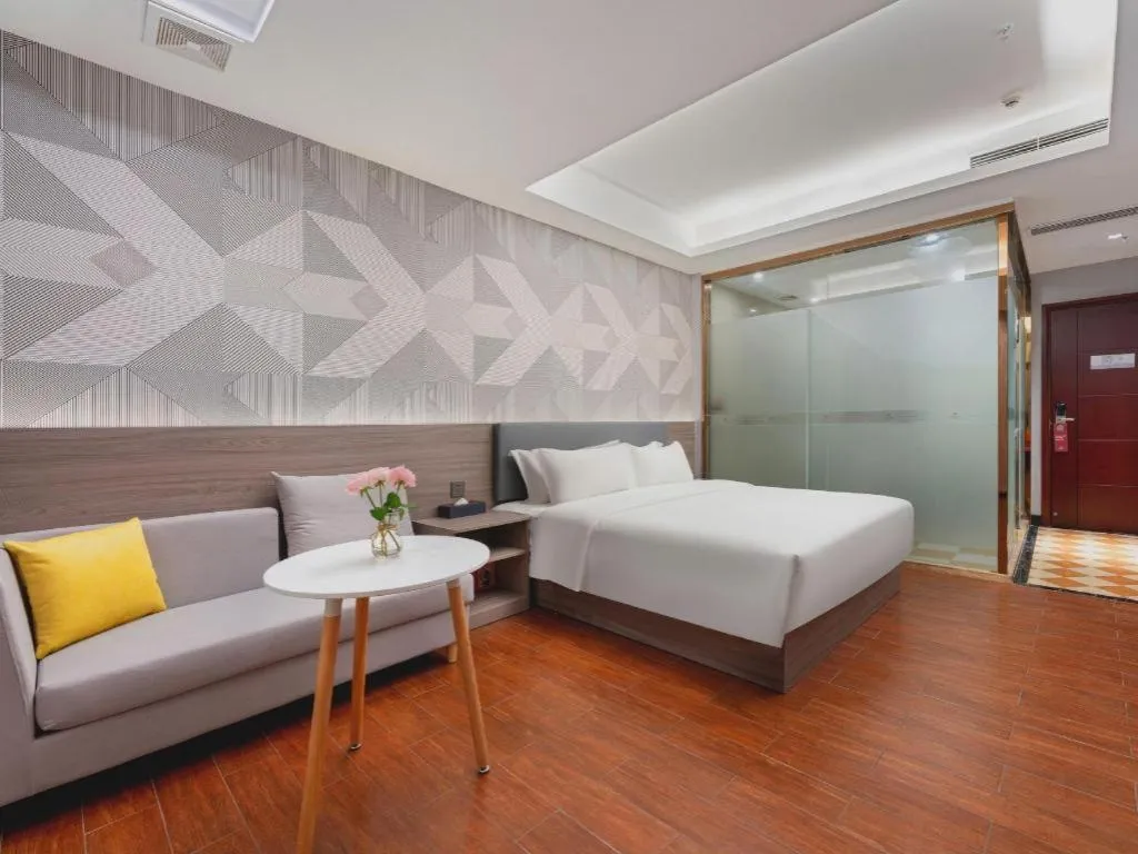 Bed in Borrman Hotel Huizhou Danshui High-speed Railway Huiyang Station