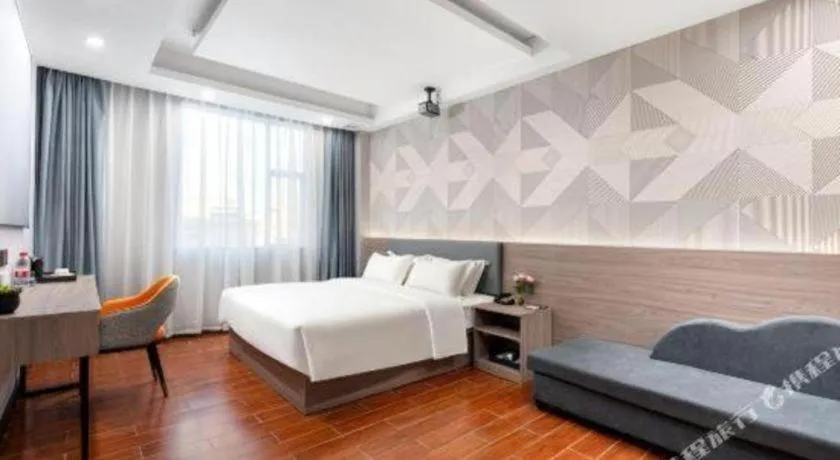 Bed in Borrman Hotel Huizhou Danshui High-speed Railway Huiyang Station