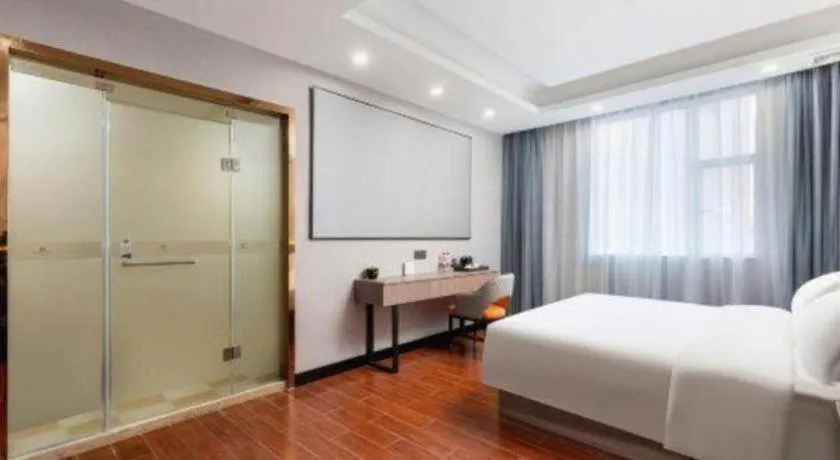 Bed in Borrman Hotel Huizhou Danshui High-speed Railway Huiyang Station