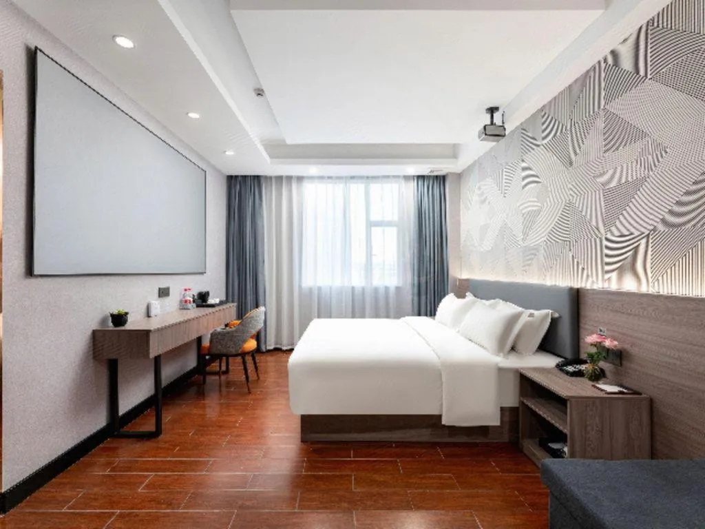 Bed in Borrman Hotel Huizhou Danshui High-speed Railway Huiyang Station