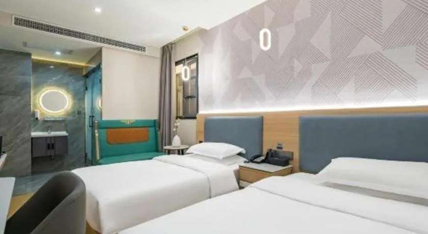 Bed in Borrman Hotel South Beijing Railway Station Caoqiao Station