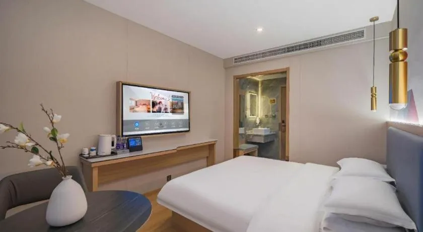 Bed in Borrman Hotel South Beijing Railway Station Caoqiao Station