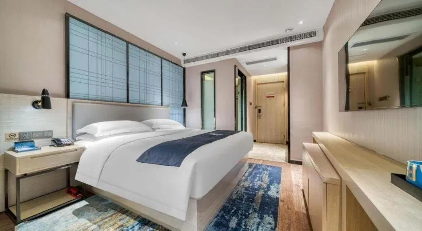 Bed in Echarm Hotel Chengdu Global Center Century City New Exhibition