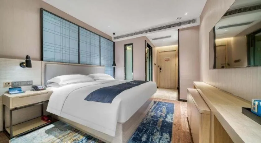 Bed in Echarm Hotel Chengdu Global Center Century City New Exhibition