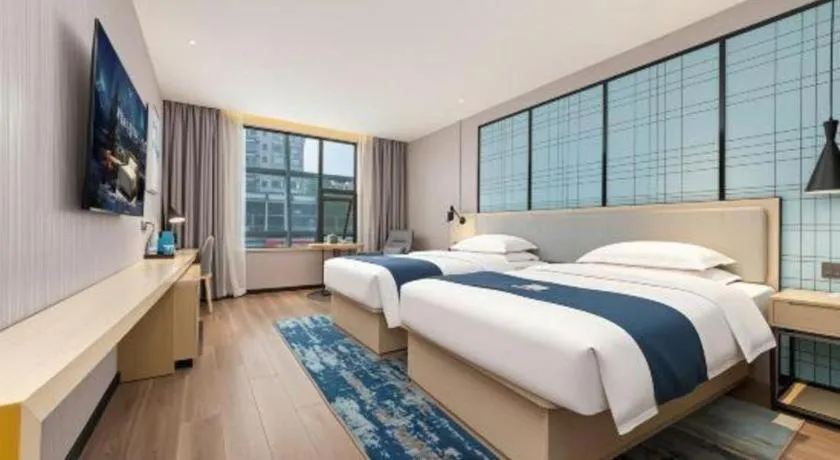 Bed in Echarm Hotel Chengdu Global Center Century City New Exhibition