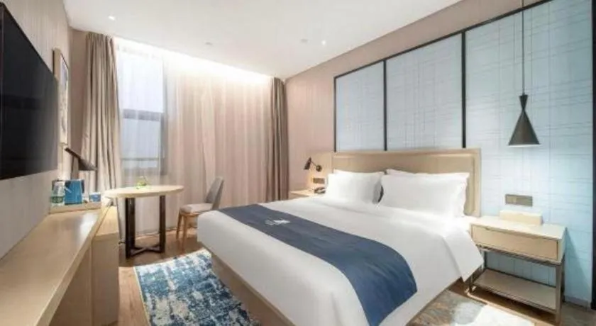 Bed in Echarm Hotel Chengdu Global Center Century City New Exhibition