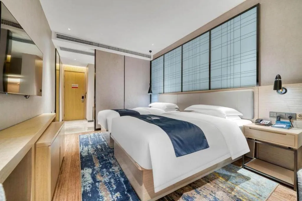 Bed in Echarm Hotel Chengdu Global Center Century City New Exhibition