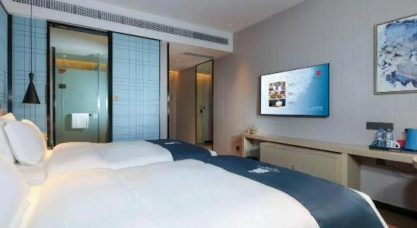 Bed in Echarm Hotel Chengdu Global Center Century City New Exhibition