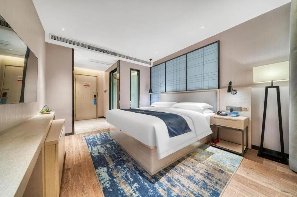 Bed in Echarm Hotel Chengdu Global Center Century City New Exhibition